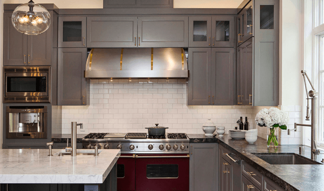 Dark gray cabinets with light-colored countertops