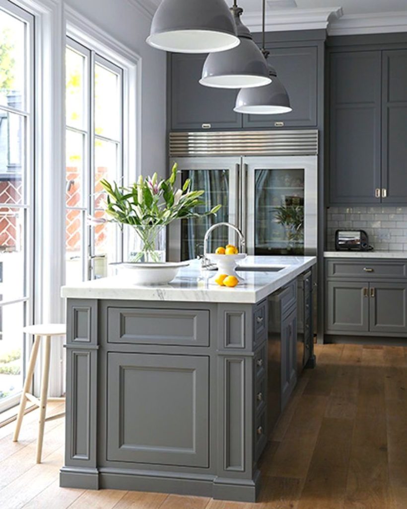 Dark gray cabinets with pendant lights