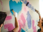 8 Ideal Ways to Clean Home After Renovation Couple paining walls.