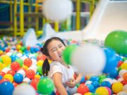 Premier types of play in your child’s development Cute girl at the Ball Pool