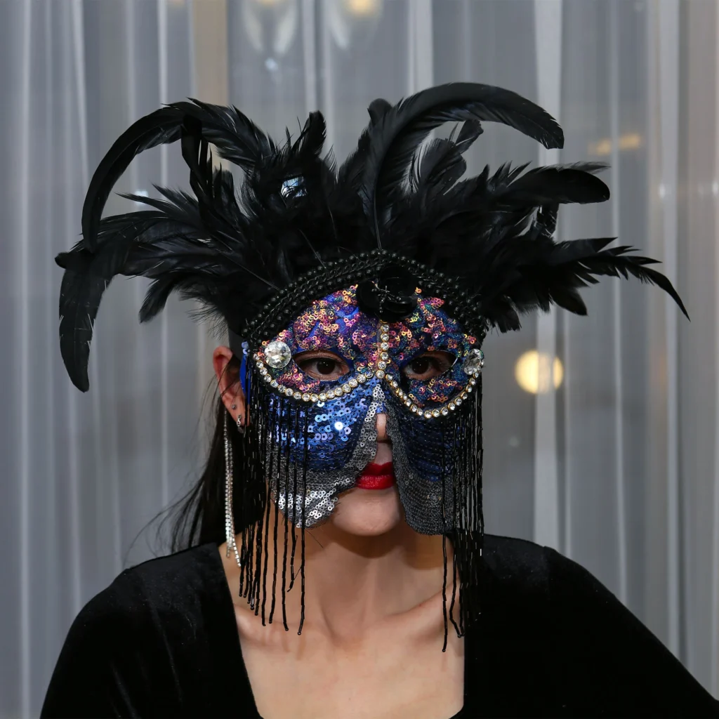 A lady with a playful mask overlaying her face, her eyes sparkling with mischief.